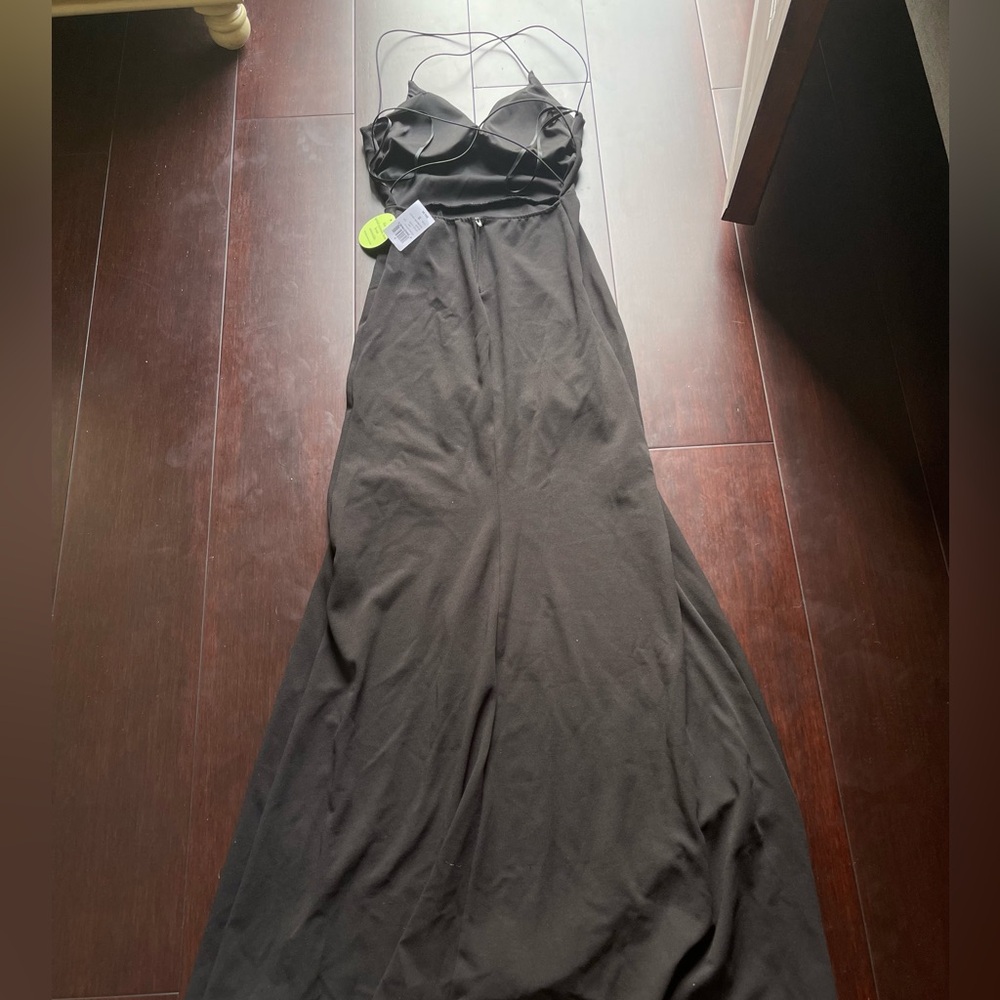 NWT. Windsor floor length backless dress with slit in the middle.